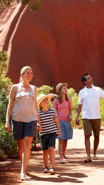 Family on base walk at uluru