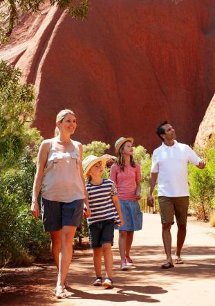 Family on base walk at uluru