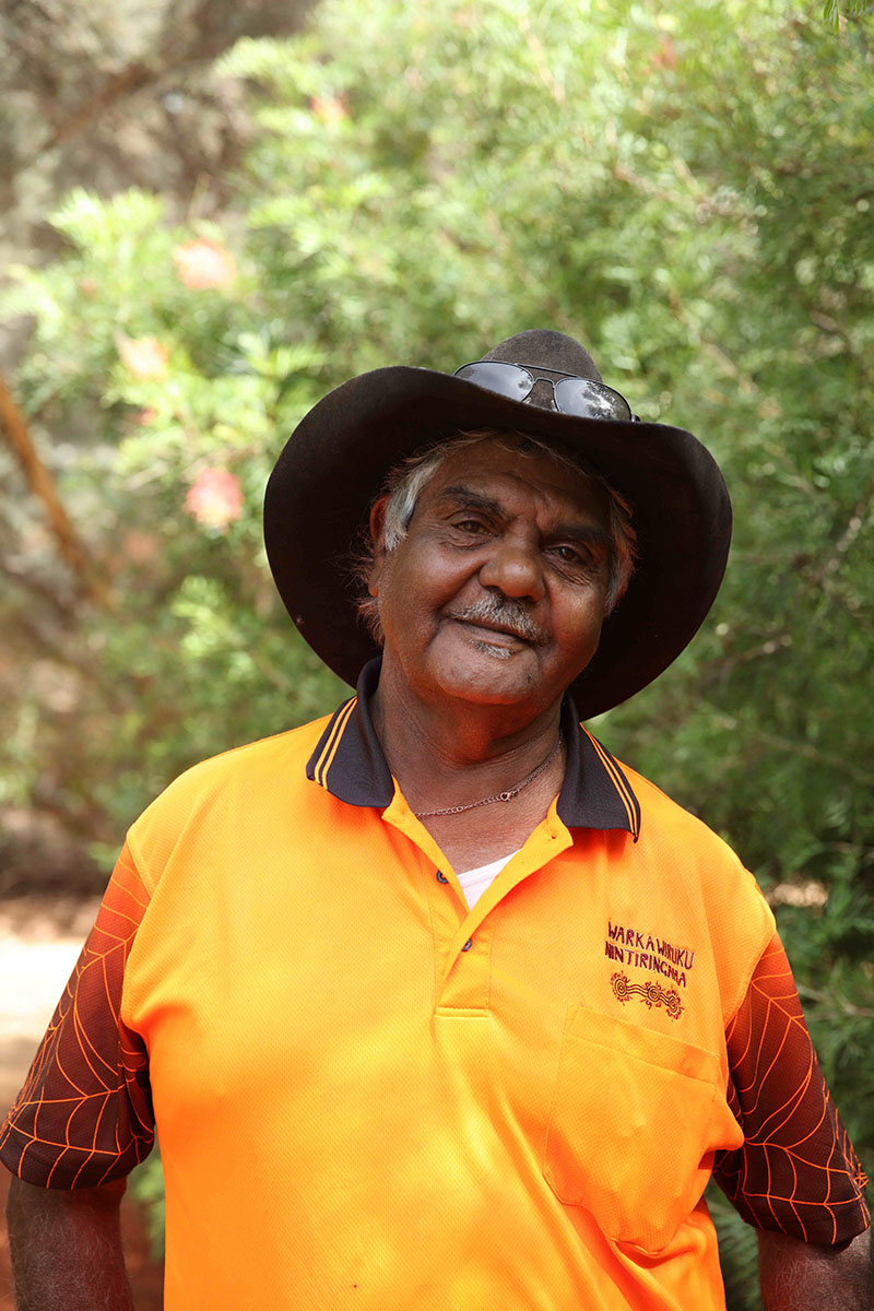 An Anangu man smiles for the camera