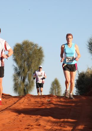 Runners compete in the Australian Outback Marathon