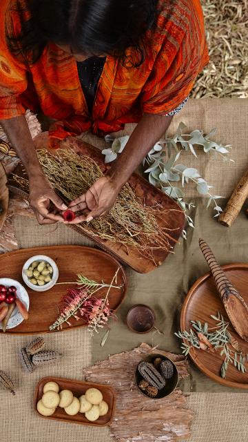 a woman and a table of food