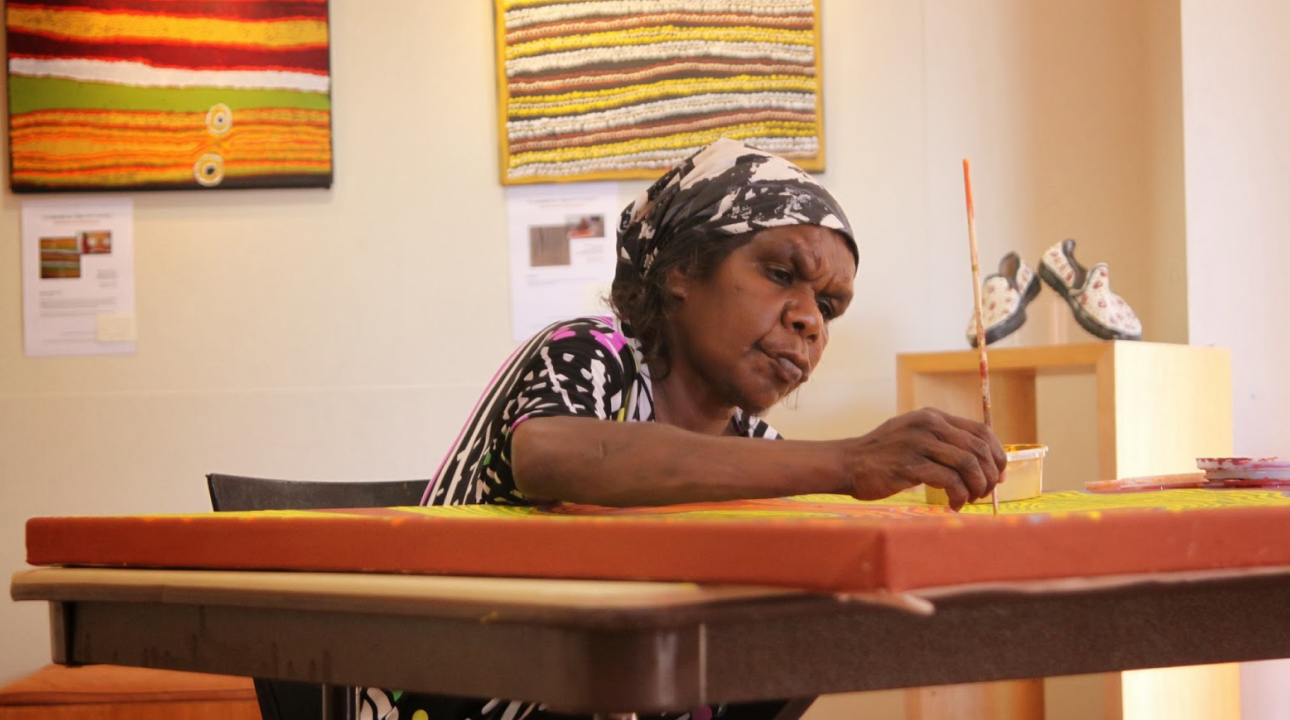 a woman painting